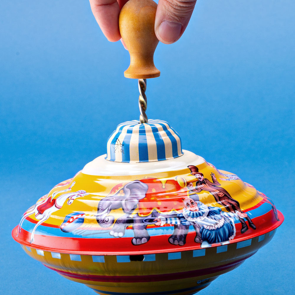 Push-Powered Humming Top
